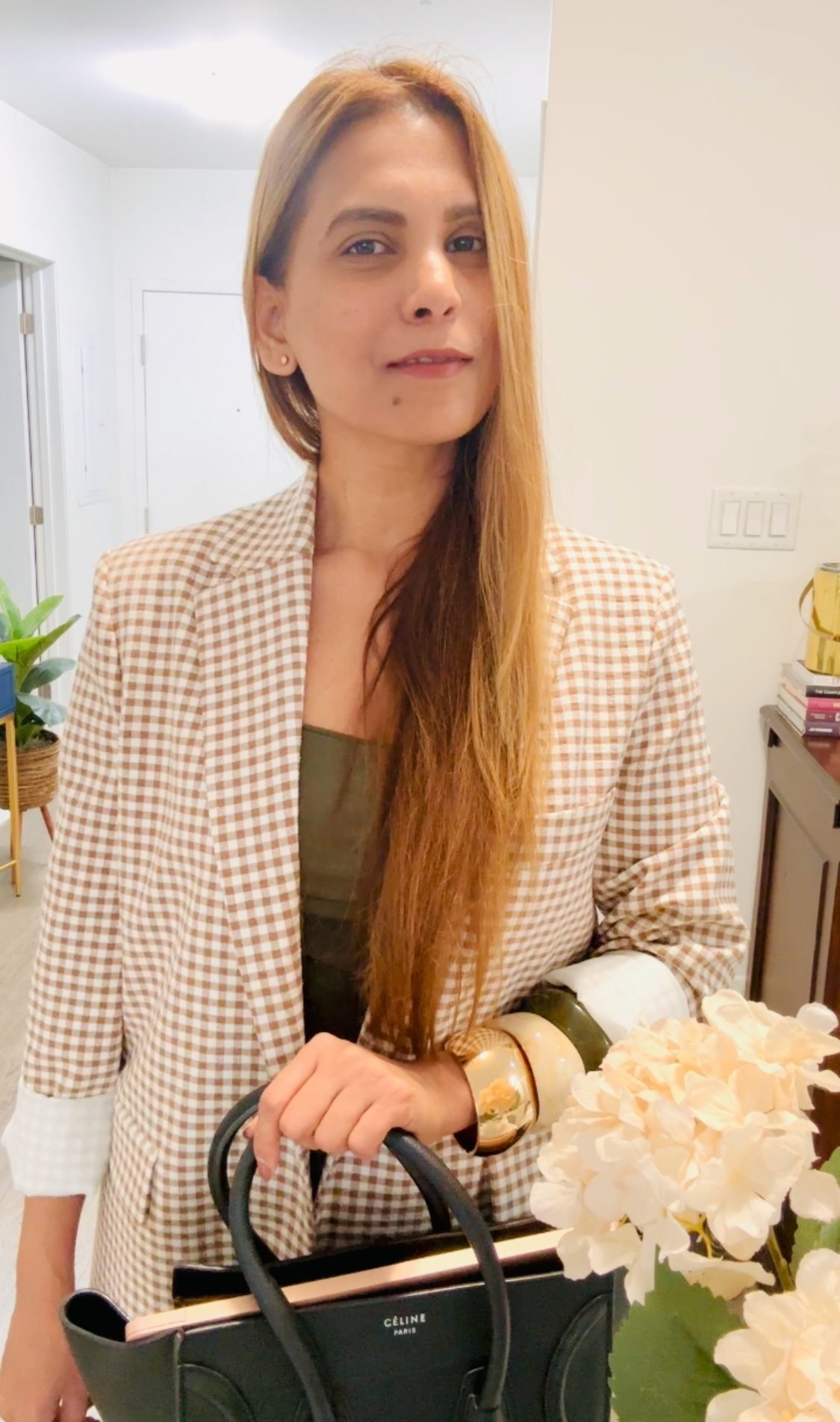 Krupa Patel in a checkered blazer
