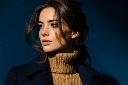 Woman wearing navy coat and camel turtleneck, showcasing a classic navy and camel color combination
