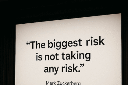 Mark Zuckerberg quote projected on a large screen: “The biggest risk is not taking any risk.”