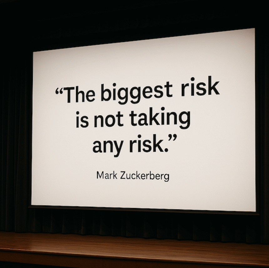 Mark Zuckerberg quote projected on a large screen: “The biggest risk is not taking any risk.”