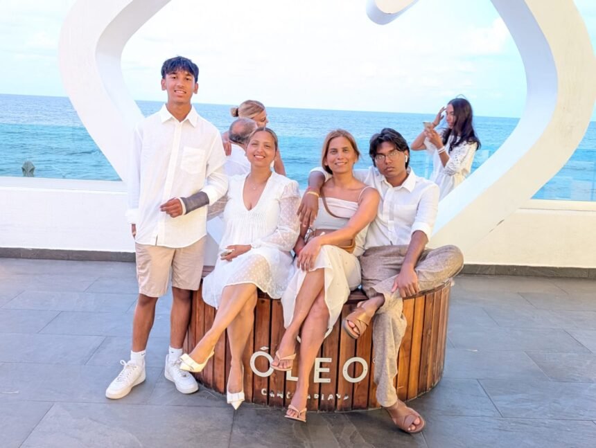 Family smiling together by the ocean — symbolizing connection, love, and togetherness.