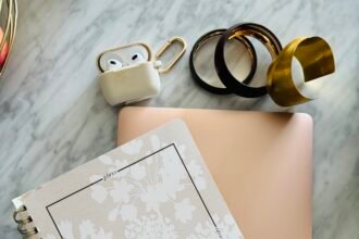 Minimal planner and laptop setup representing systems and structure for entrepreneurial success