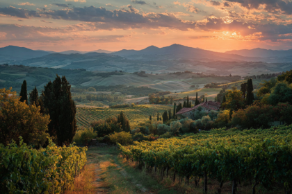 Sunrise over rolling vineyards in Tuscany, Italy, representing slow travel, intentional living, and a location-independent lifestyle