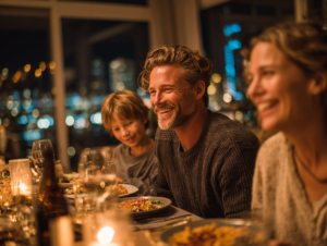 family enjoying dinner together at night with warm lighting creating meaningful dining table conversations