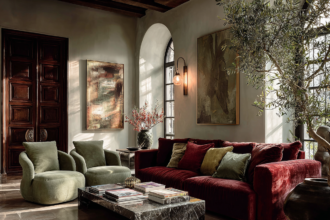 luxury living room with velvet sofa marble table layered decor rule of three home styling